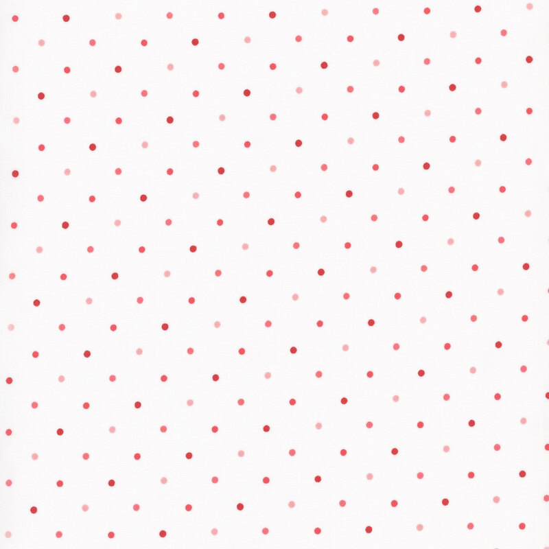 white fabric with red and pink polka dots