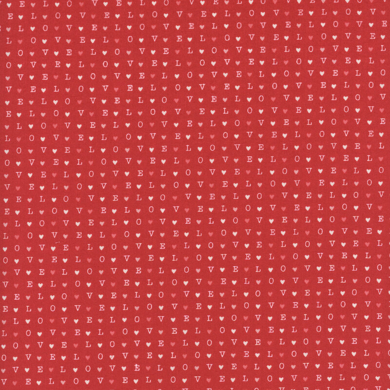 red fabric with a repeated pattern of the word love and hearts
