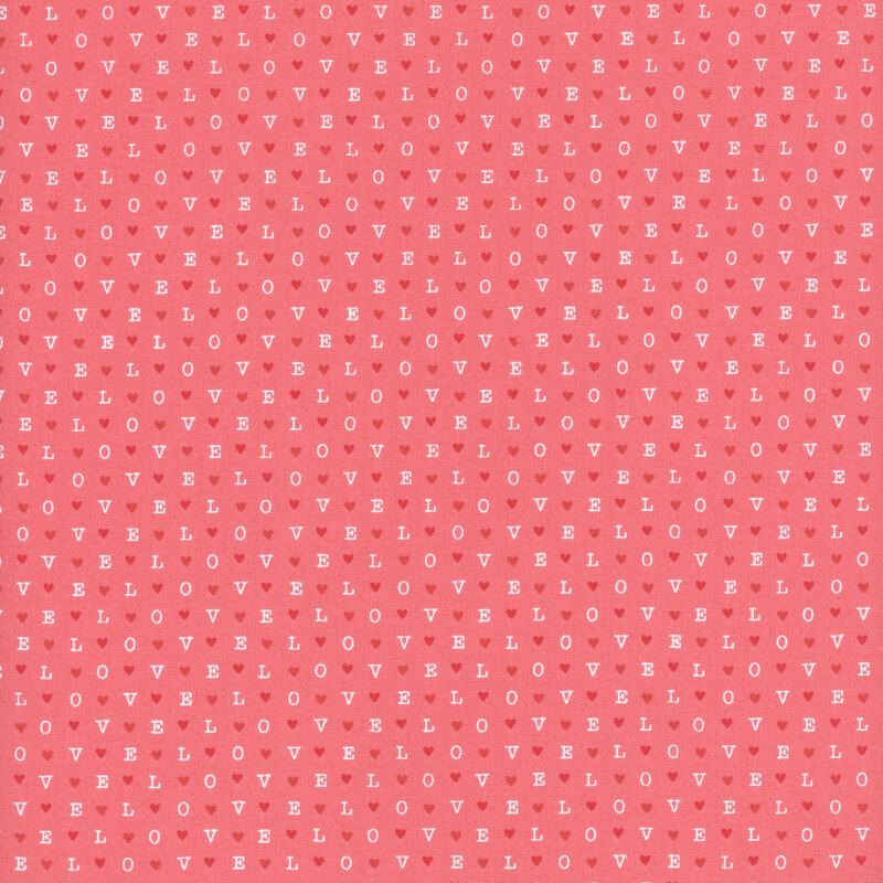 Medium pink fabric with a repeated pattern of the word love and hearts