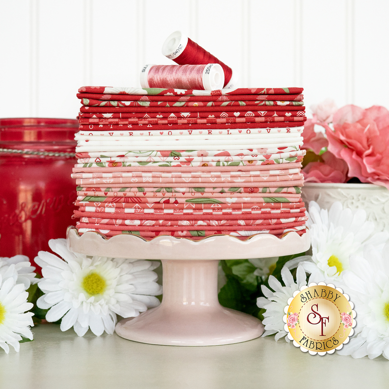 A Love Blooms Fat Eighth Bundle in shades of white, pink and red