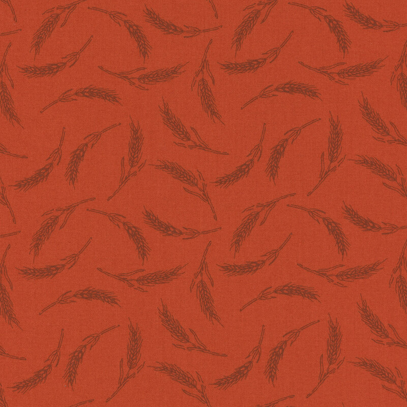 Red fabric with a tonal wheat pattern 