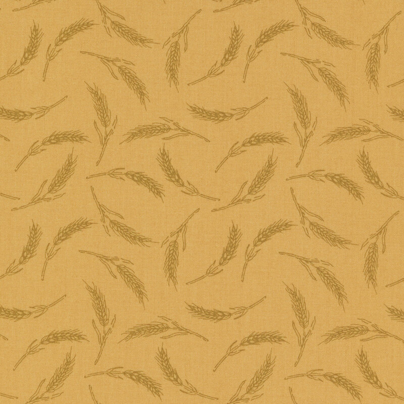 yellow fabric with a tonal wheat pattern
