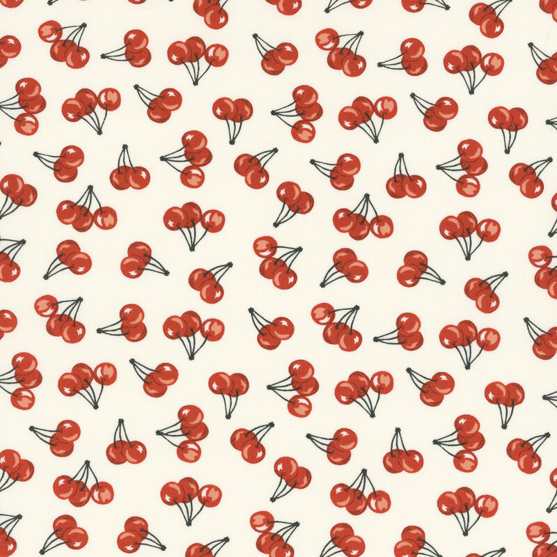 Cream fabric with a scattered cherry pattern