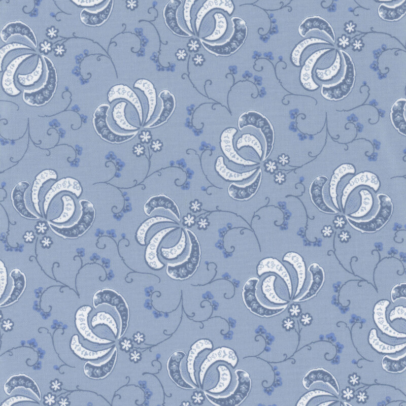Blue fabric with a tonal floral pattern 