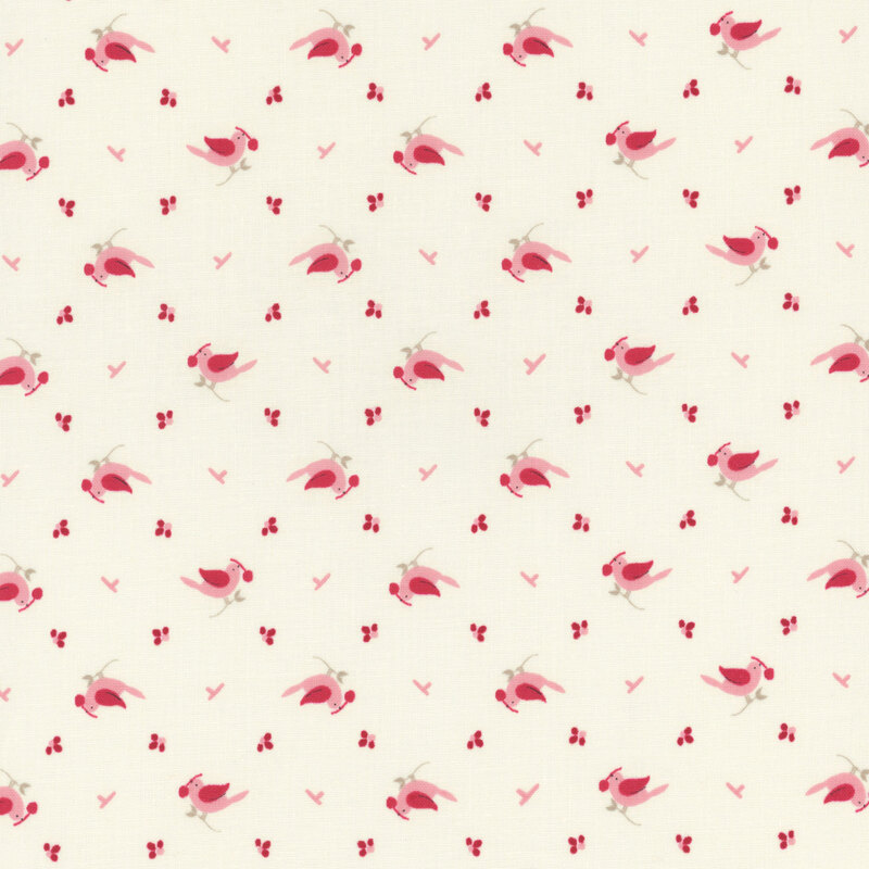 White fabric with a pink ditzy bird and cherry pattern