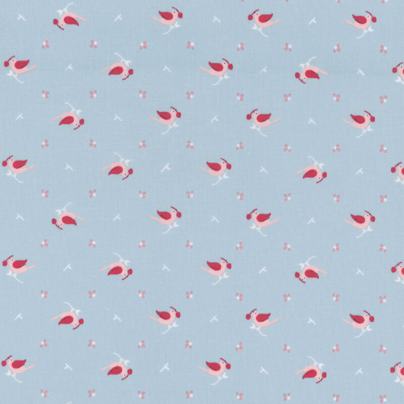 Blue fabric with a ditzy bird and fruit design