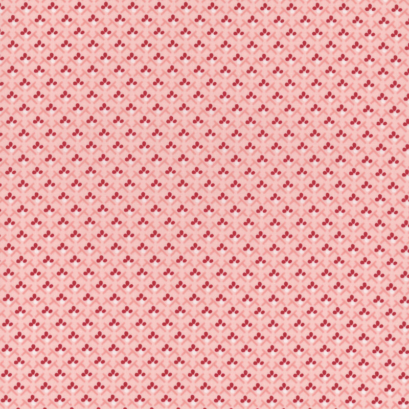 Pink fabric with a red floral pattern 
