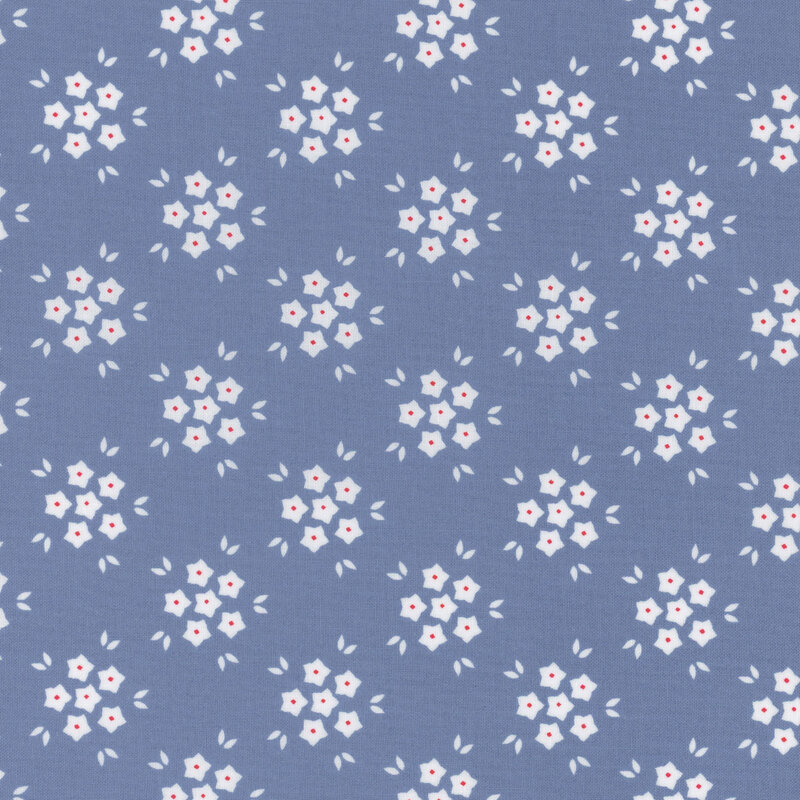 Blue fabric with a white geometric flower pattern