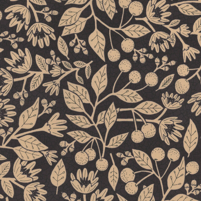 Black fabric with a cracked earth textured background and large tan leaves, vines, berries, and flowers throughout