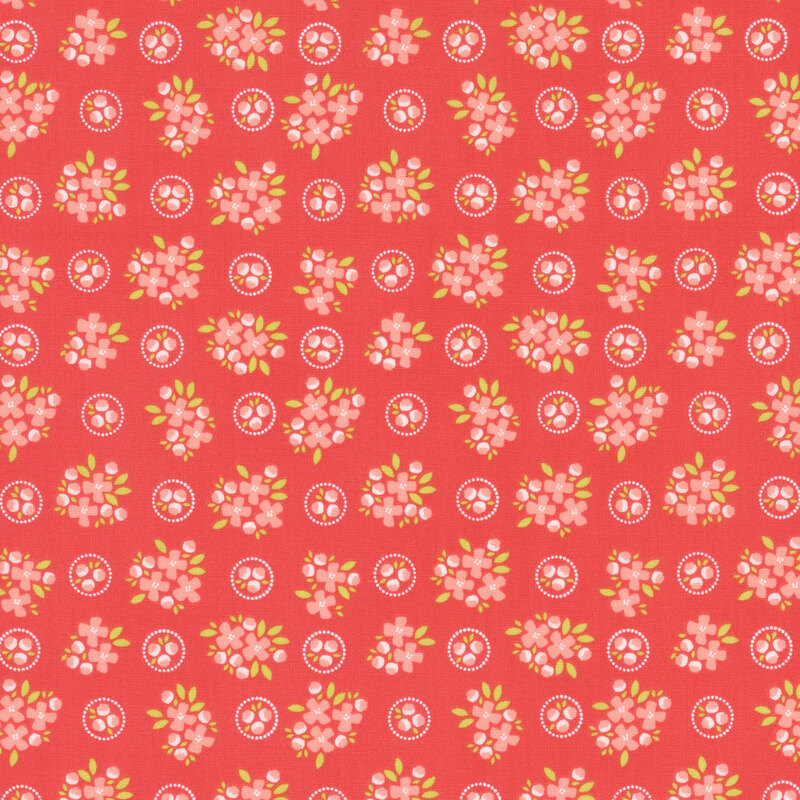 Reddish pink fabric with bright reddish pink floral clusters spaced evenly throughout