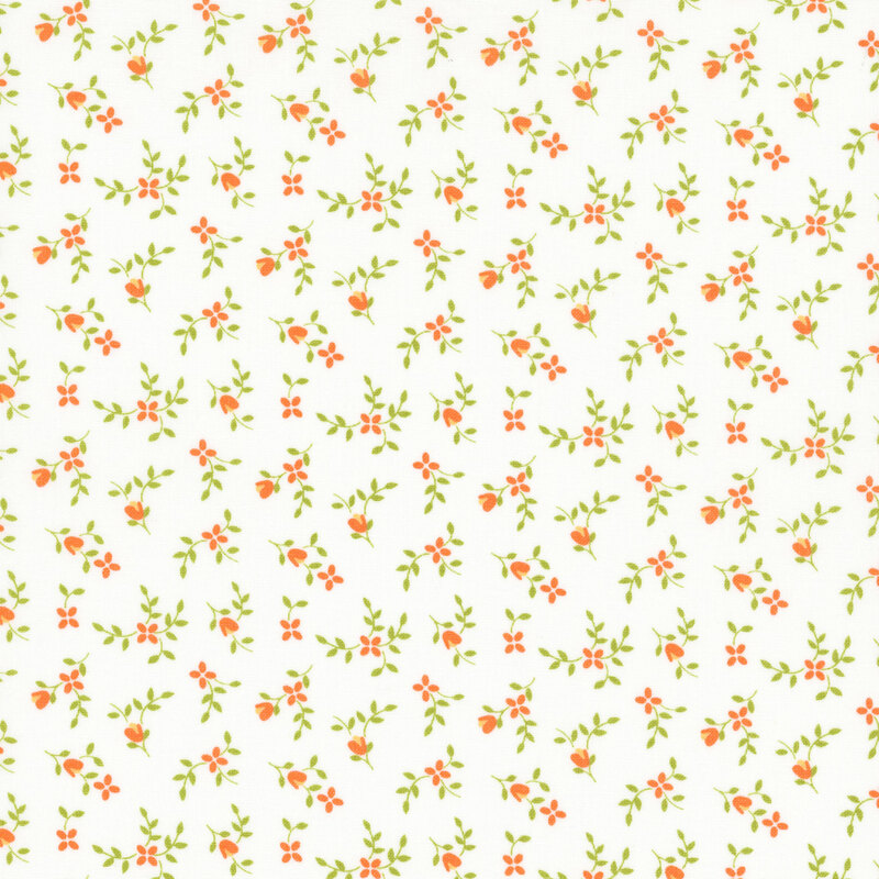 White fabric with ditsy red flowers and green sprigs throughout