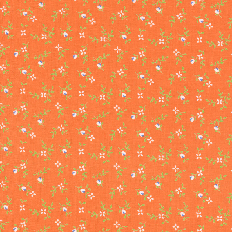 Orange fabric with ditsy pink flowers and green sprigs throughout