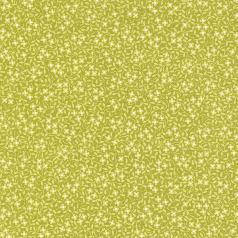 Lime green fabric with little white flowers and in a calico pattern throughout