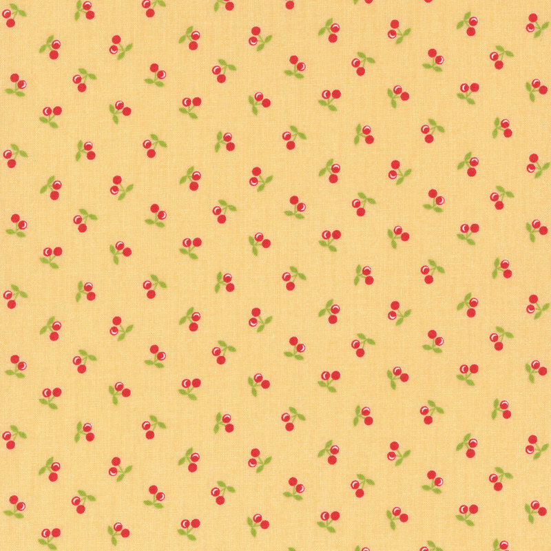 Yellow fabric with ditsy little red berries with green stems spaced evenly throughout