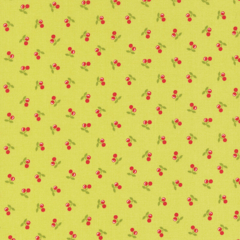 Lime green fabric with small red ditsy berries spaced evenly apart