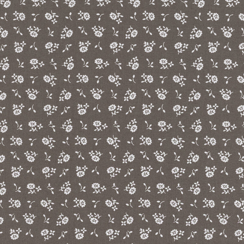 Dark gray fabric with small white ditsy flowers and sprigs throughout