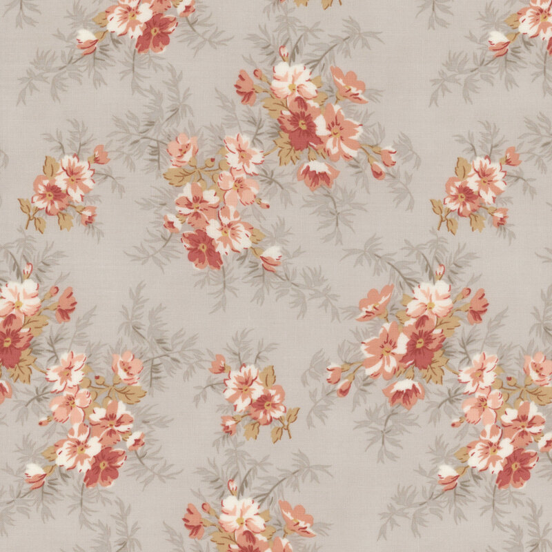 gray fabric with pink flowers and bushy leaves