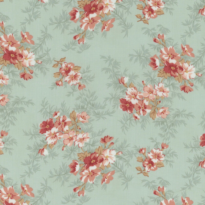 light aqua fabric with pink flowers and bushy leaves