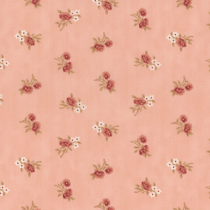 pink fabric with rotating flower sprigs