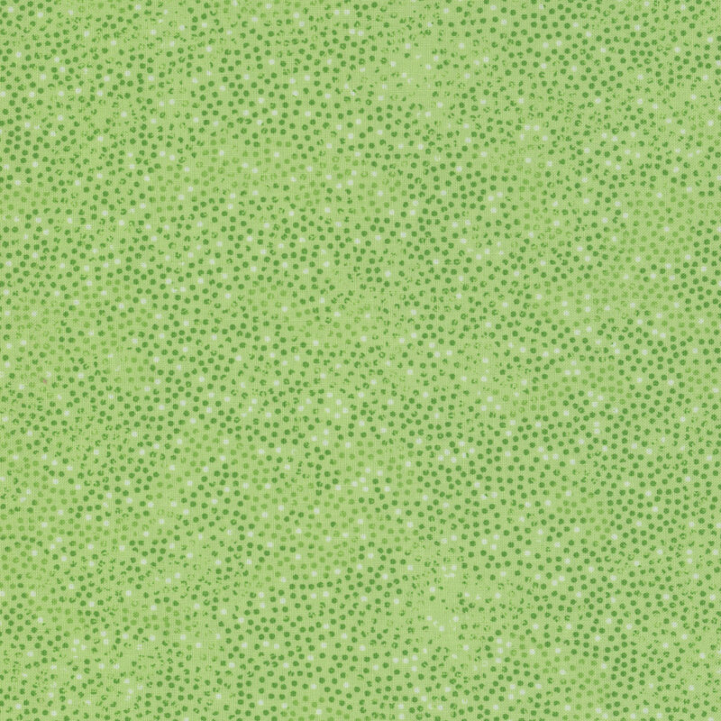 green fabric with small green and white dots