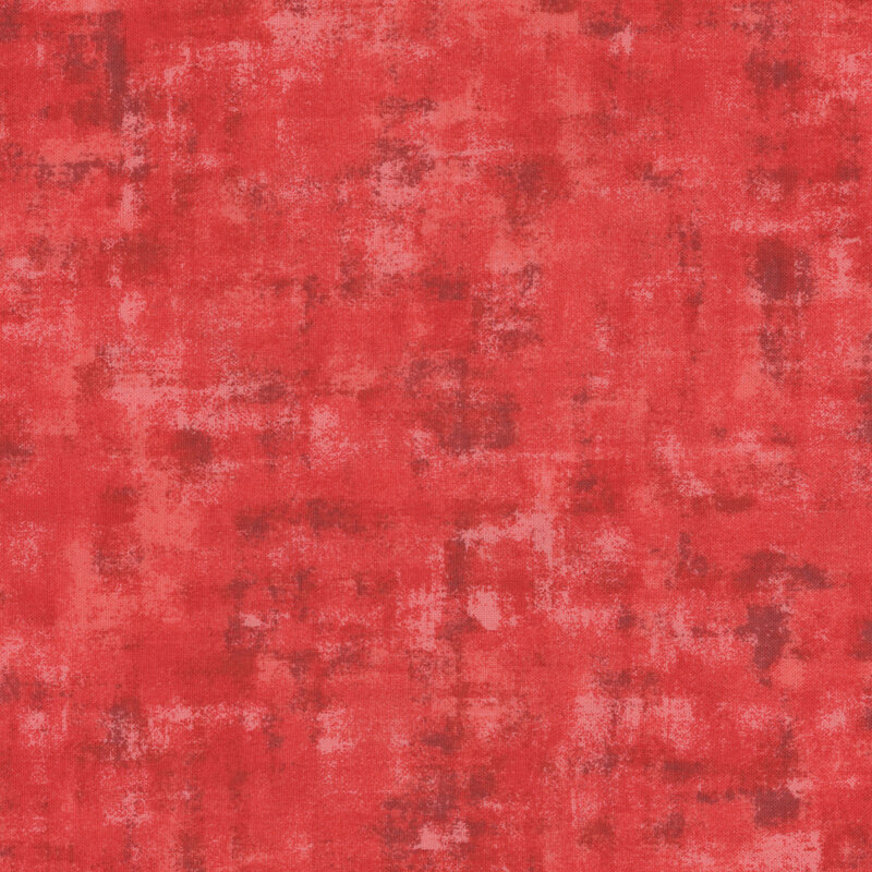 red fabric with a tonal, textured overlay