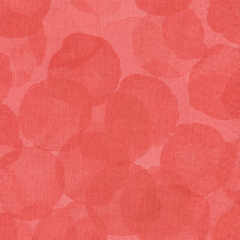 red fabric with large, tonal watercolor drops