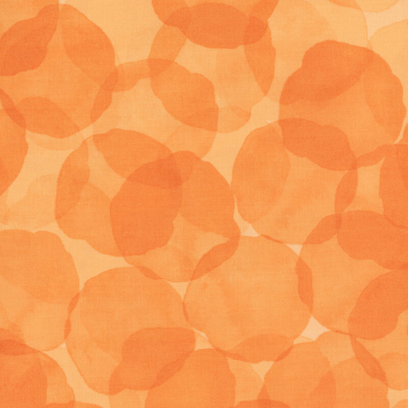 orange fabric with large, tonal watercolor drops