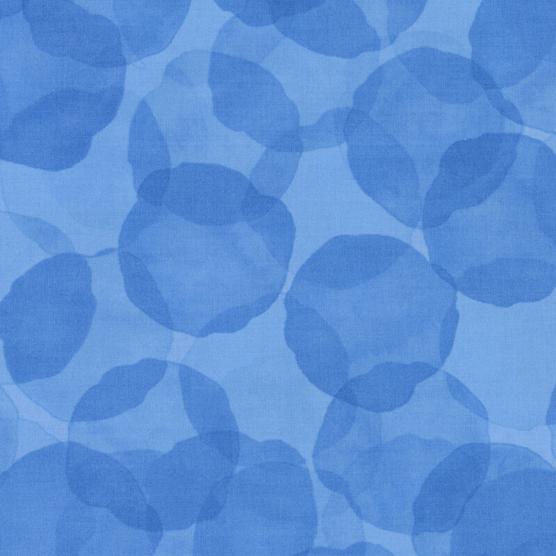 blue fabric with large, tonal watercolor drops