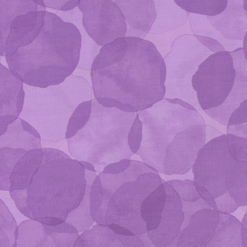 bright purple fabric with large, tonal watercolor drops
