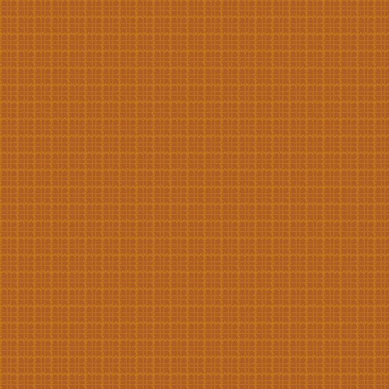 Burnt orange flannel fabric with a tonal plaid pattern