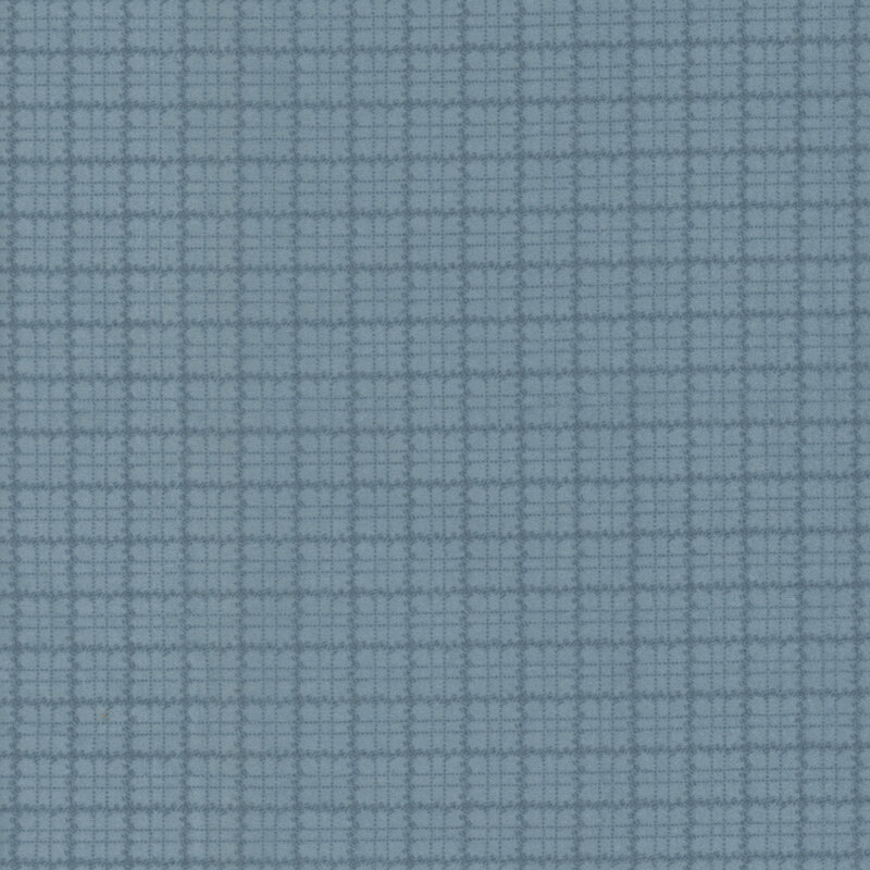 Blue flannel fabric with a tonal plaid pattern