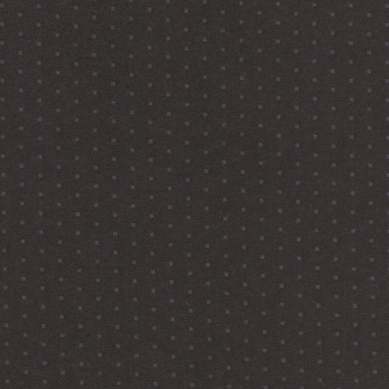 Black flannel fabric with tonal polka dots