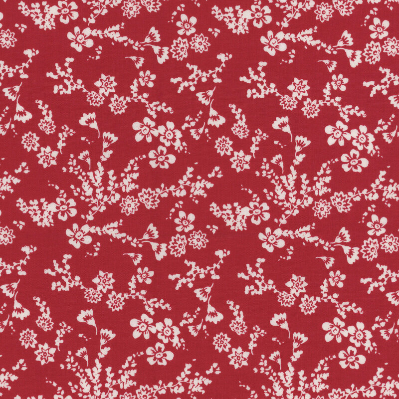 red fabric with sprawling white florals