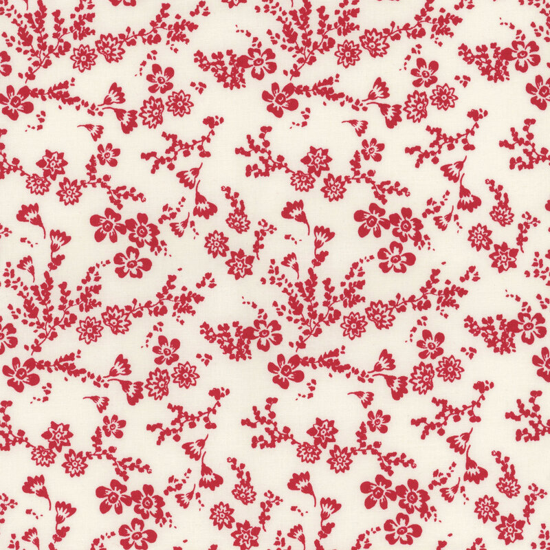 white fabric with sprawling red florals