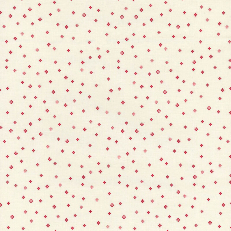 white fabric with tiny red simplified four-petaled flowers