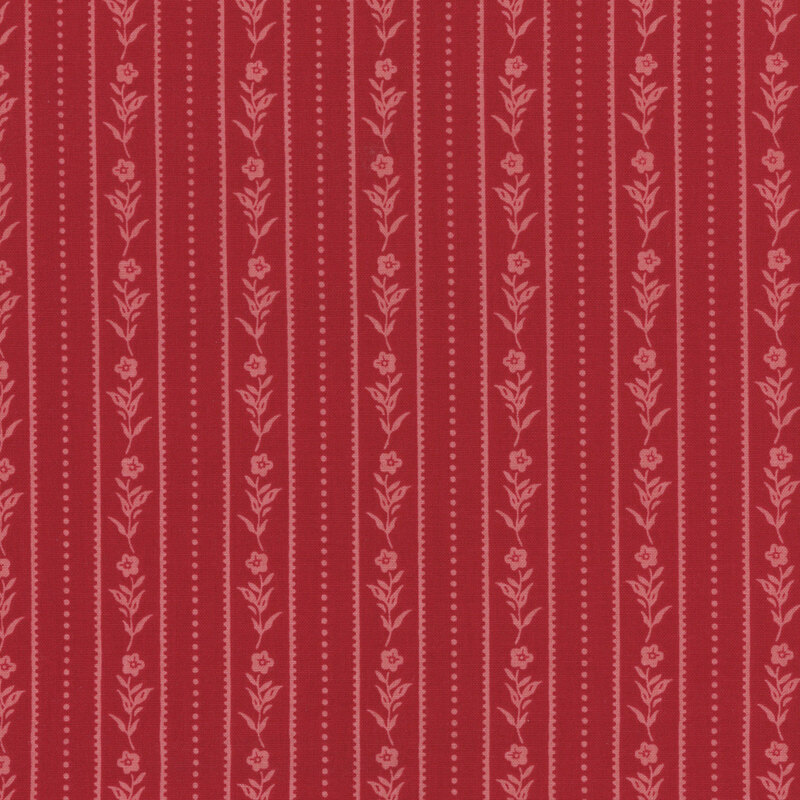 tonal red fabric with vertical lines of flowers, dotted lines, and stripes