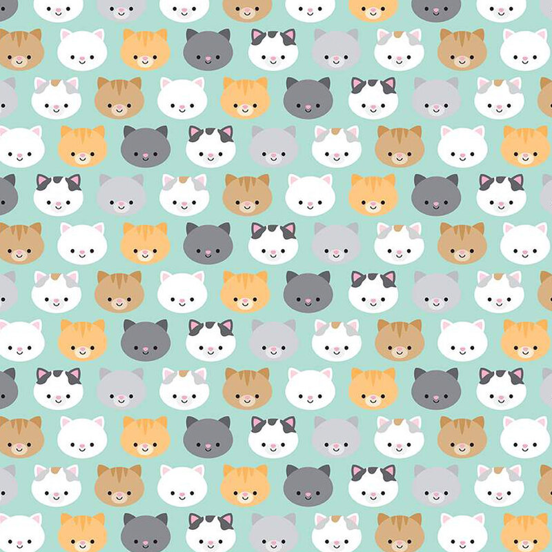 aqua fabric with colorful orange, black, gray, and white cat faces all over