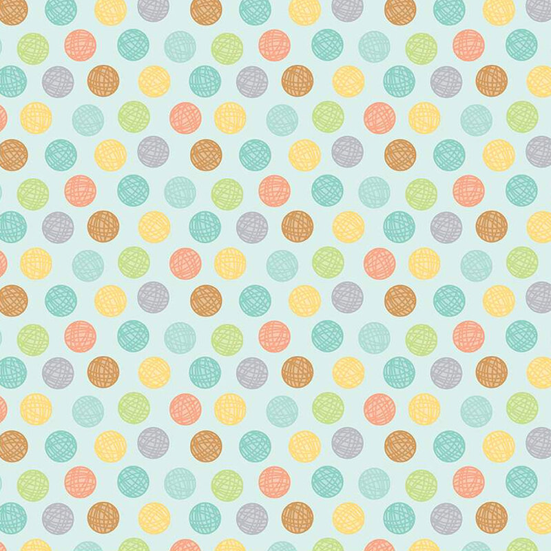 aqua sewing fabric with colorful balls of yarn polka dots all over