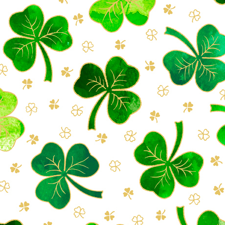 White fabric with tossed large green shamrocks and little tan shamrocks throughout