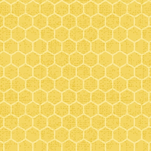 Yellow fabric with a tonal honeycomb pattern