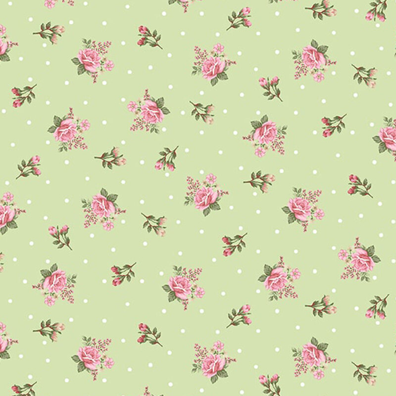 Pastel green fabric with white polka dots and a ditzy rose pattern