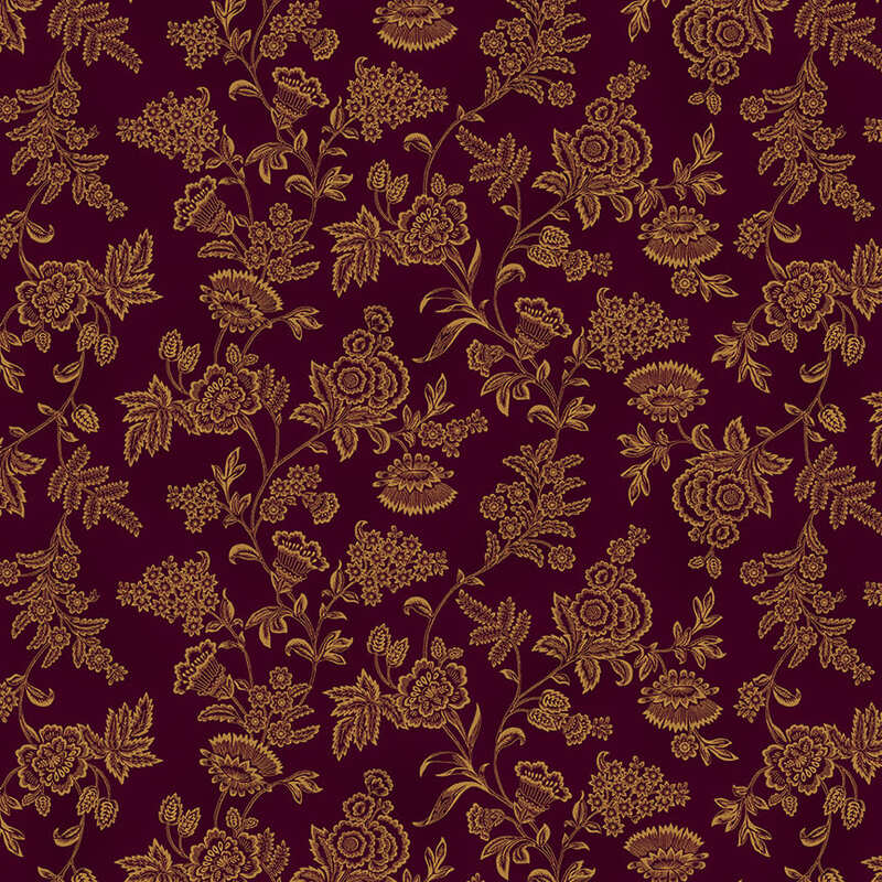 Mottled purple fabric with a golden floral pattern 