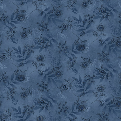 Mottled blue fabric with a tonal flower pattern 