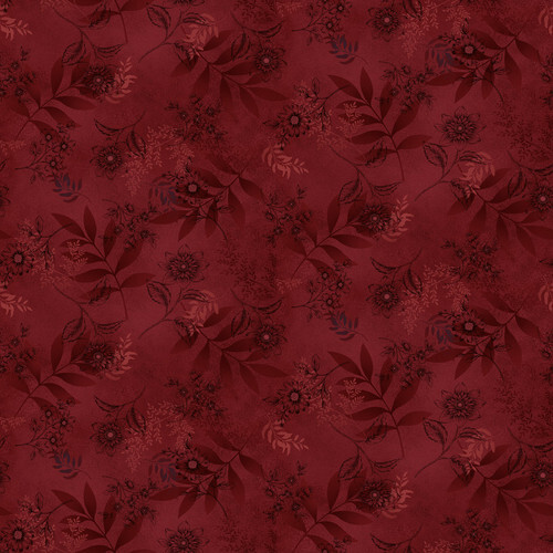 Mottled red fabric with a tonal floral and leaf pattern 