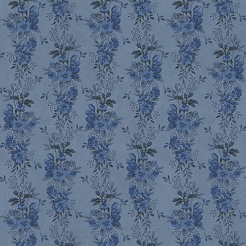 Blue fabric with a tonal floral stripe pattern 