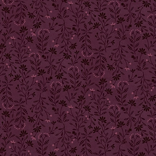 Purple fabric with a tonal leaf and flower pattern 
