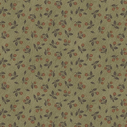 Green fabric with a ditzy fruit pattern 