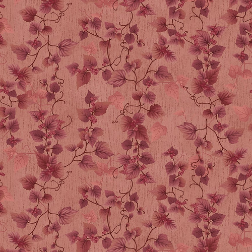 Mottled pink fabric with a tonal leaf pattern