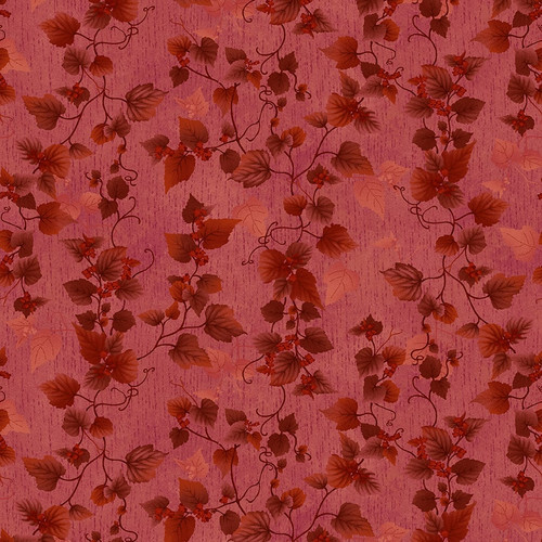 Mottled red fabric with a tonal leaf and vine pattern 