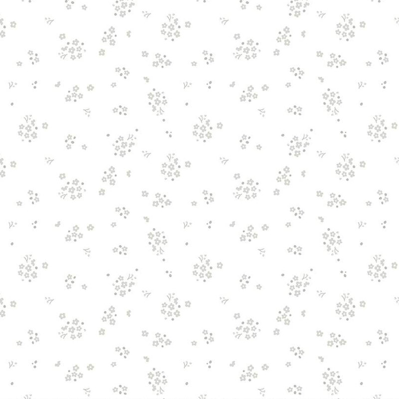 fabric with small gray floral clusters against a white background